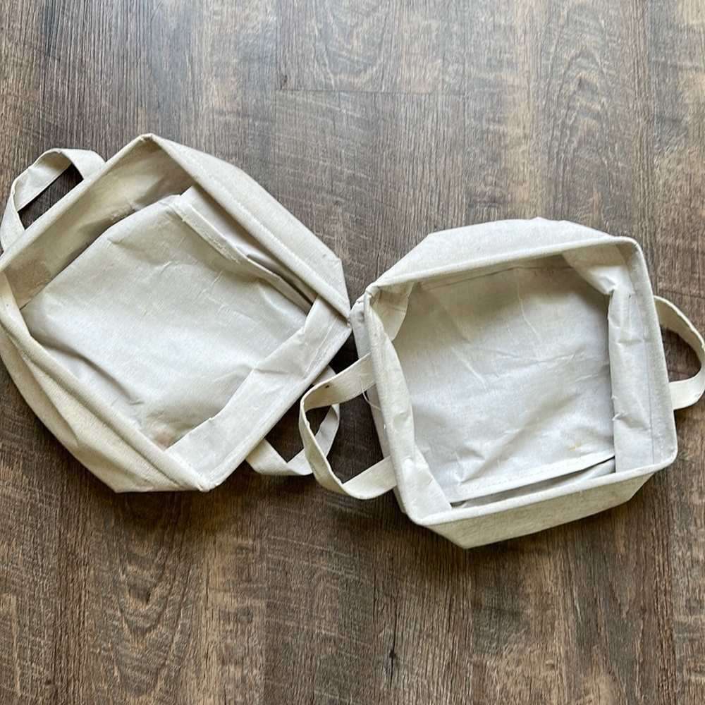 2 tan bins for storage like makeup